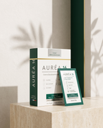 AURÉA 16, crème déodorante vegan sans aluminium, présentée sur pierre travertin