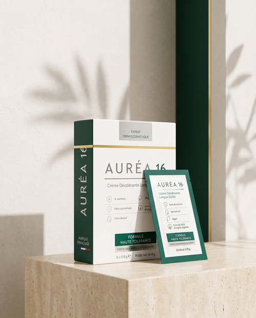 AURÉA 16, crème déodorante vegan sans aluminium, présentée sur pierre travertin